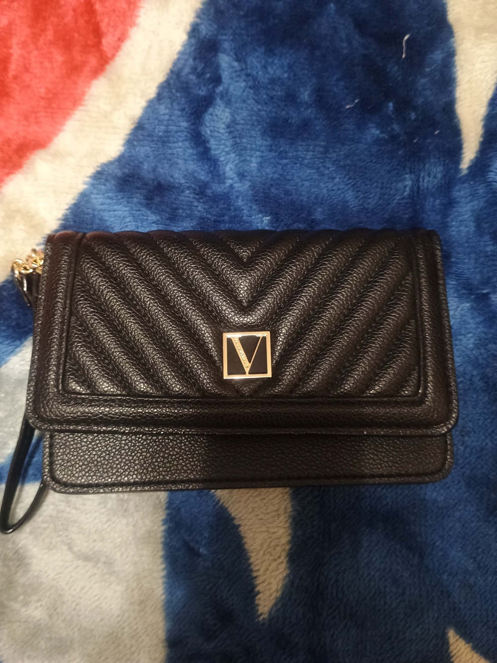 Black Quilted Women’s Crossbody Bag with Gold Emblem